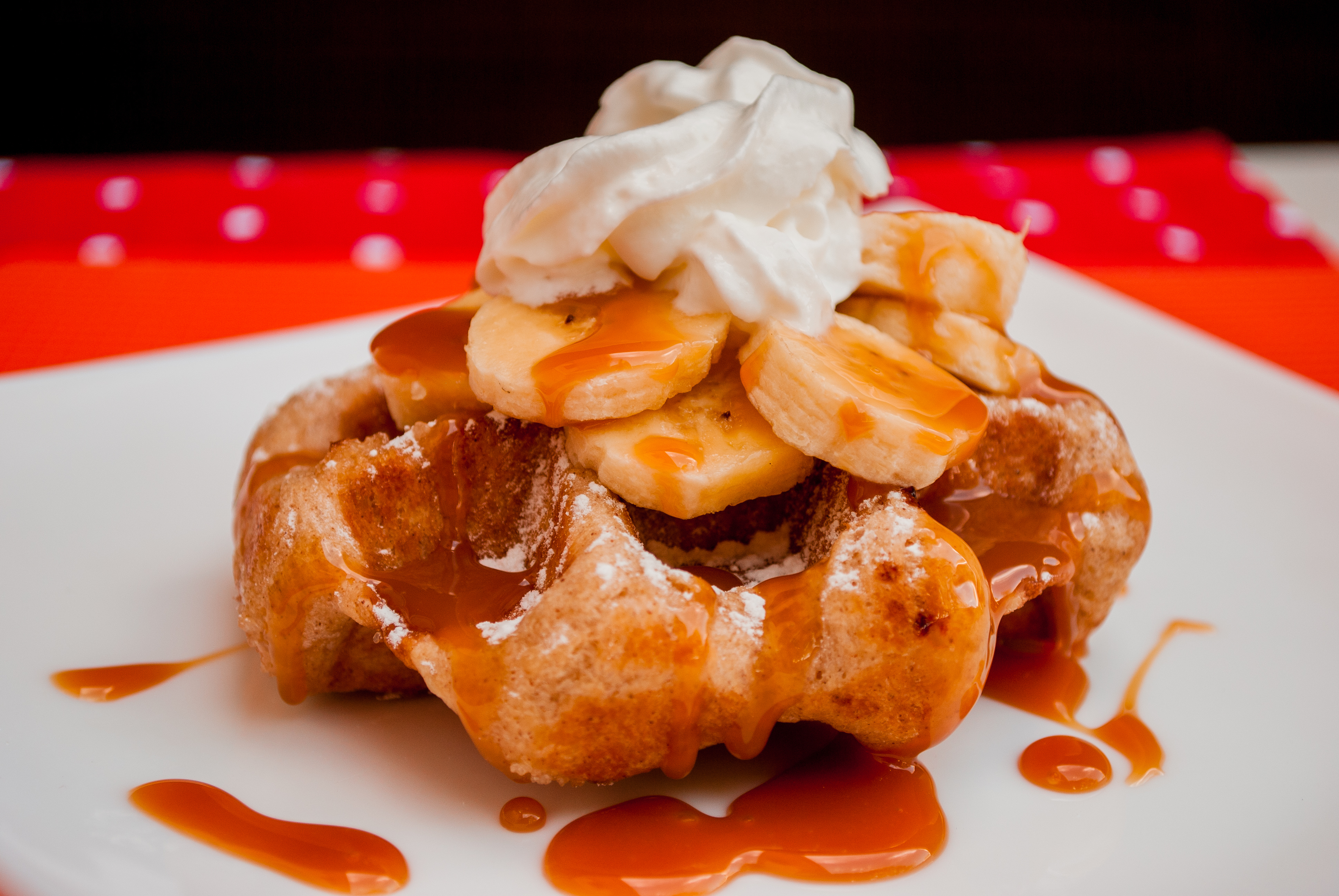 Liège Belgian waffles with bananas, caramel and whipped cream